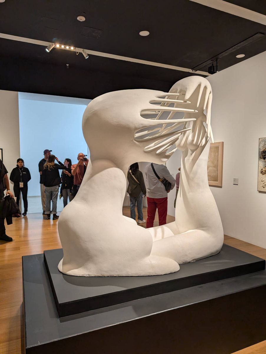 A white sculpture in a gallery