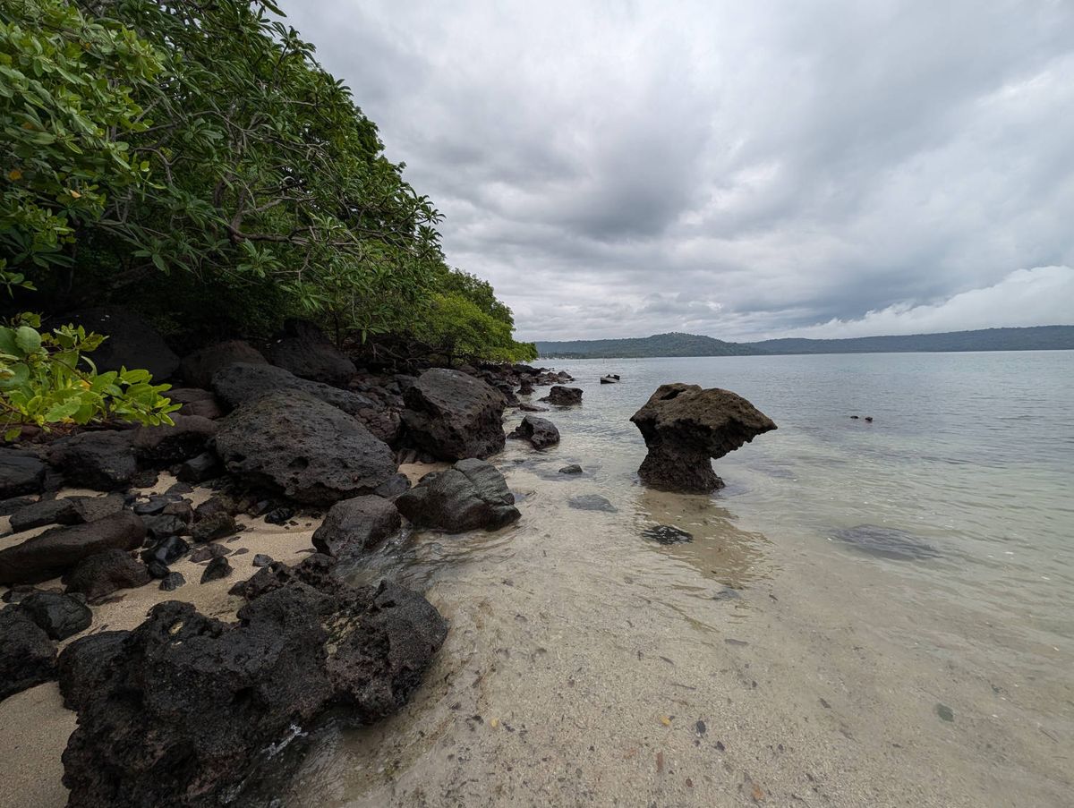 Black rocks and the bay