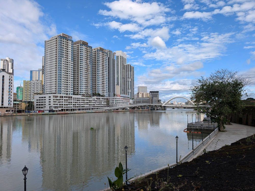 Towers along the river in Manila