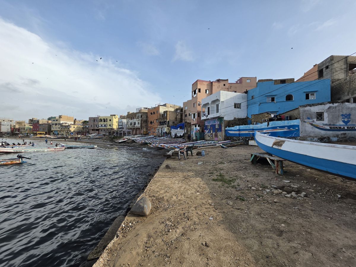 The quay and the painted houses