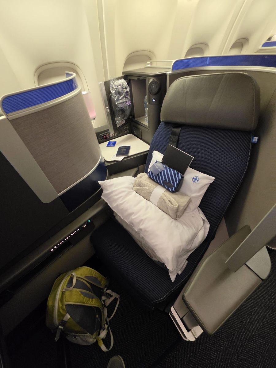 A window seat, set with bedding and the Brooks Brothers kit