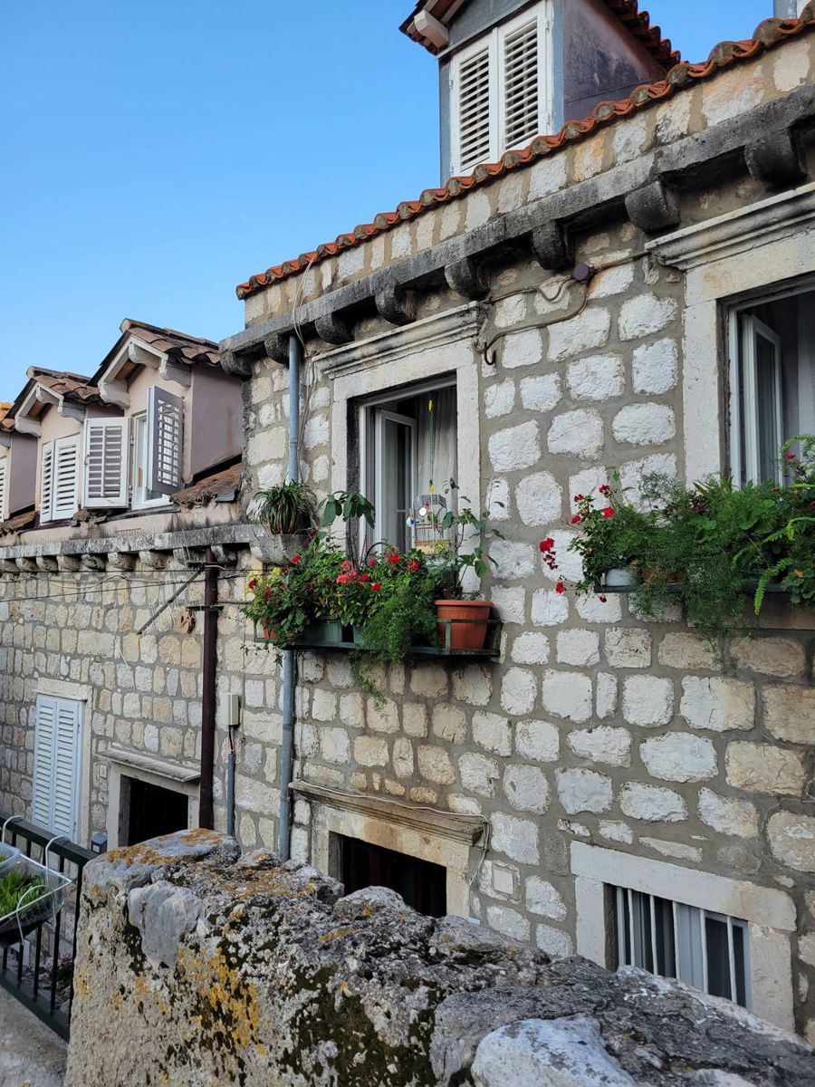 Flower boxes on a stone house