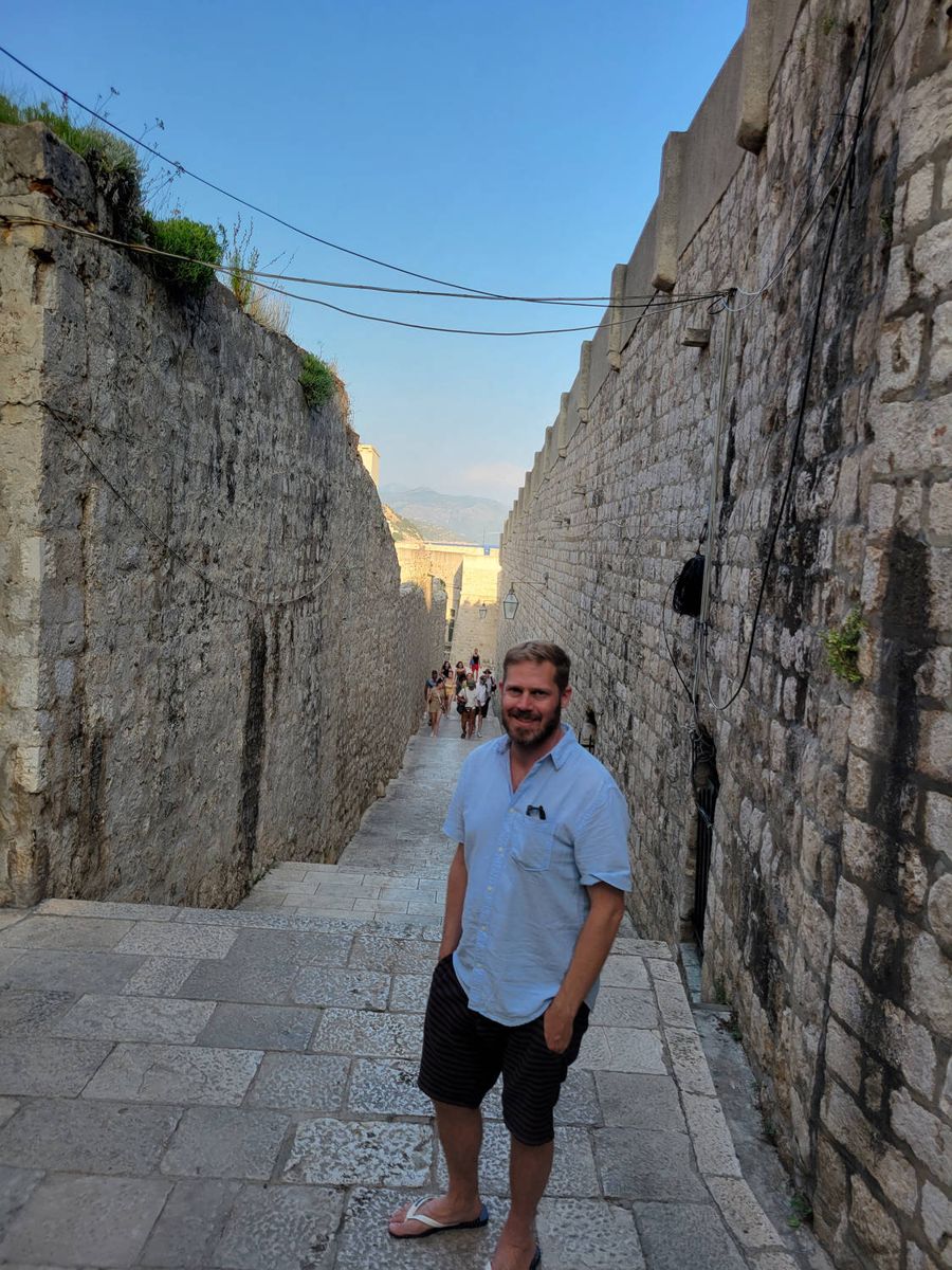 Brendan in a lane along the wall