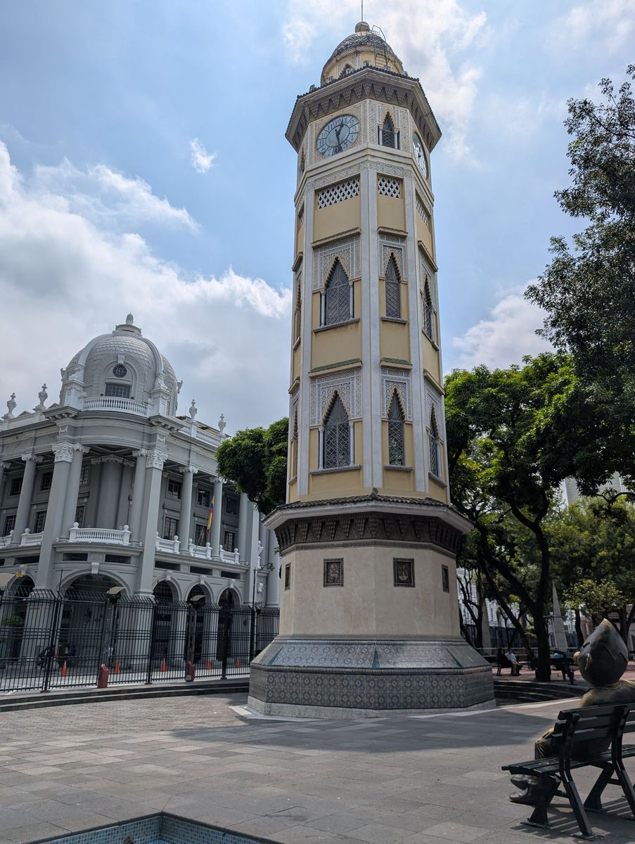 The Moorish Clock Tower, with Juan Pueblo on his bench