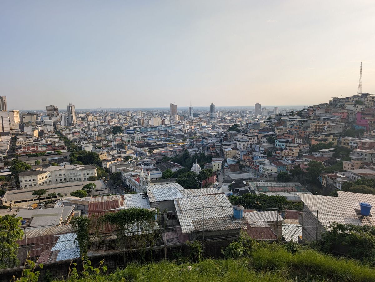 Downtown, over the tin roofs below the hill
