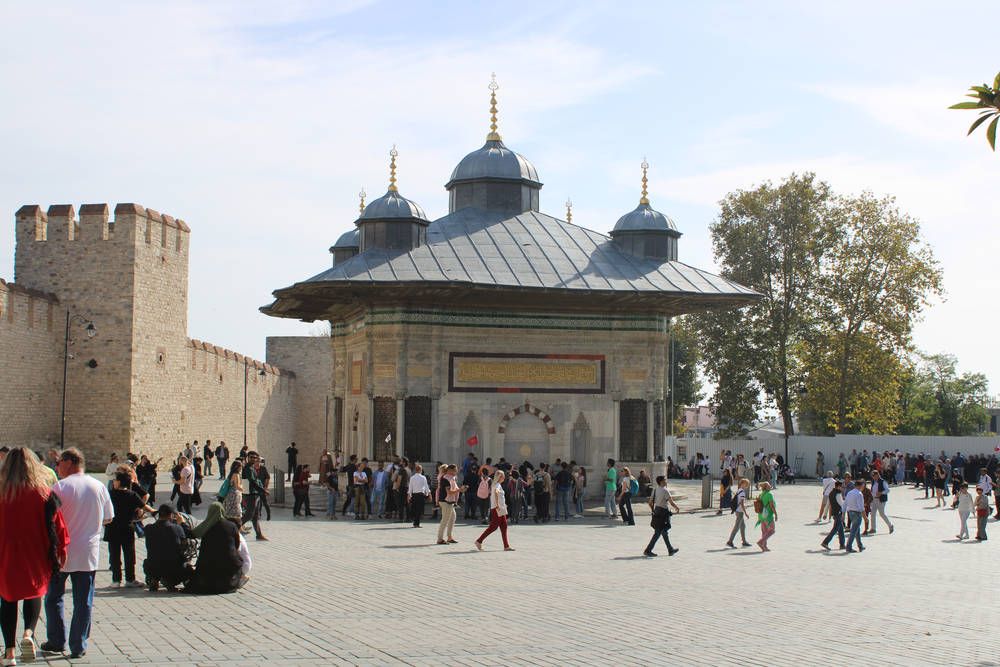 A square with an ornate fountain