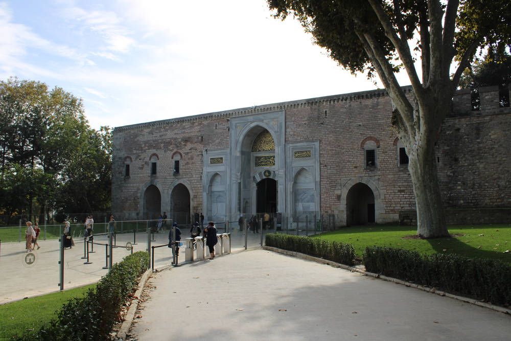 A long stone wall with arches