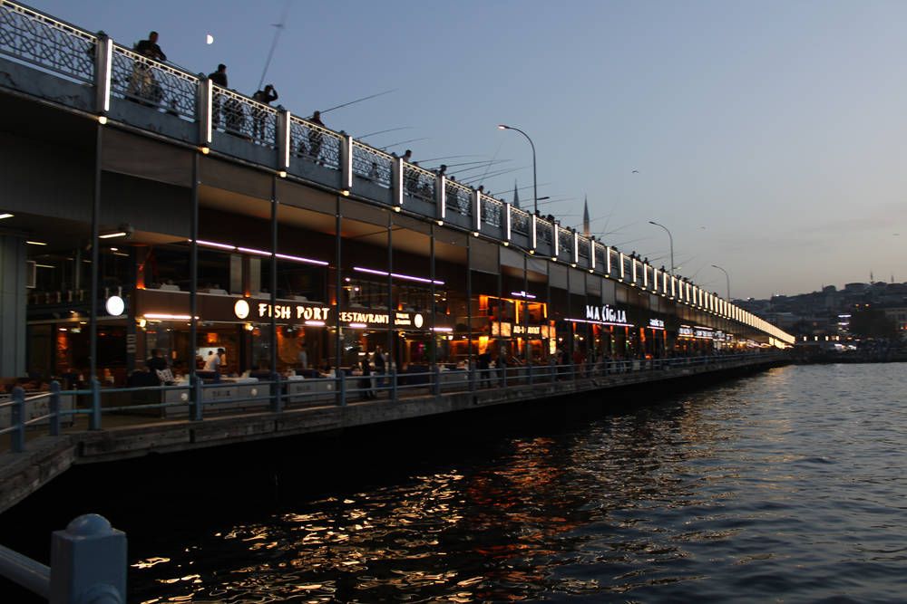 The lower level of the bridge lit up