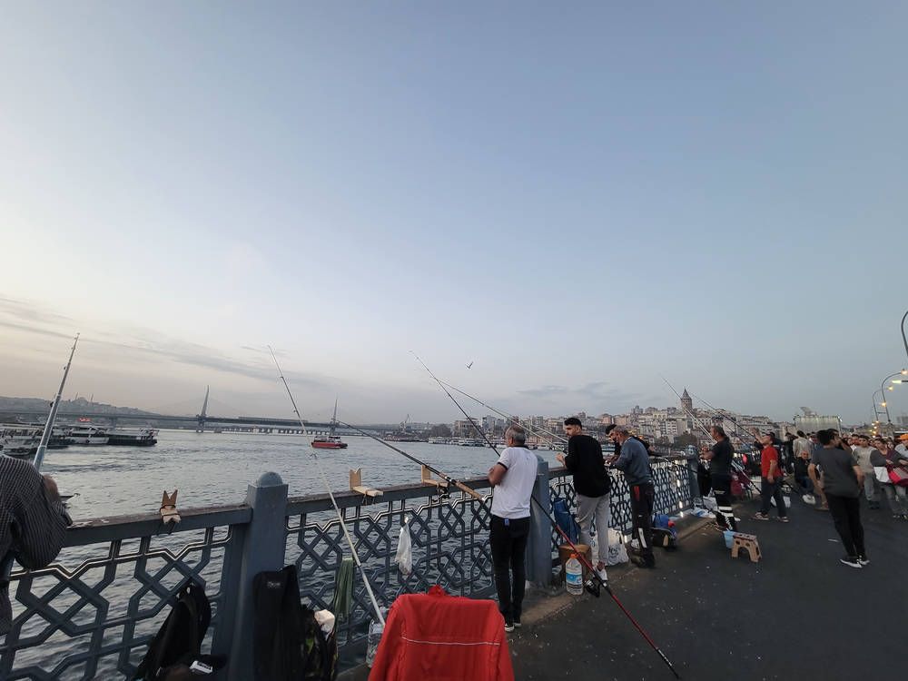 People fishing from the bridge