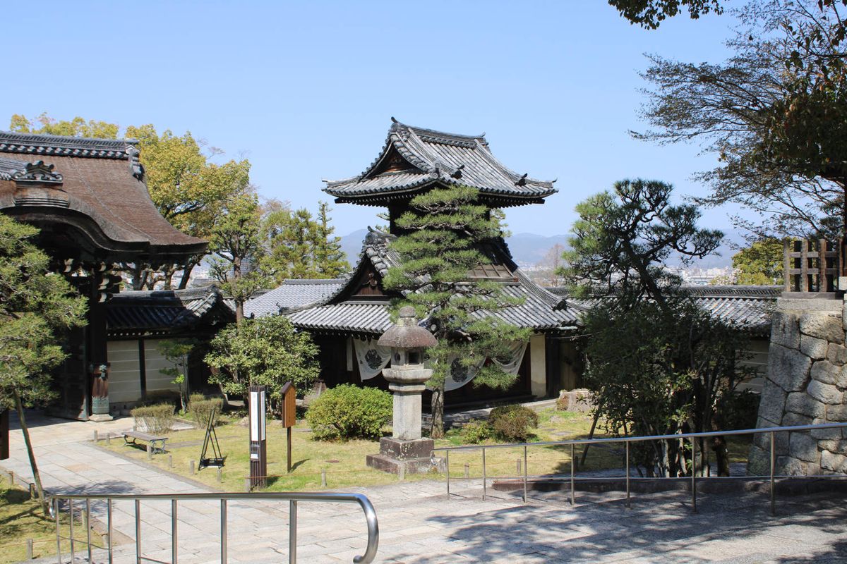 A temple garden with a stone lantern