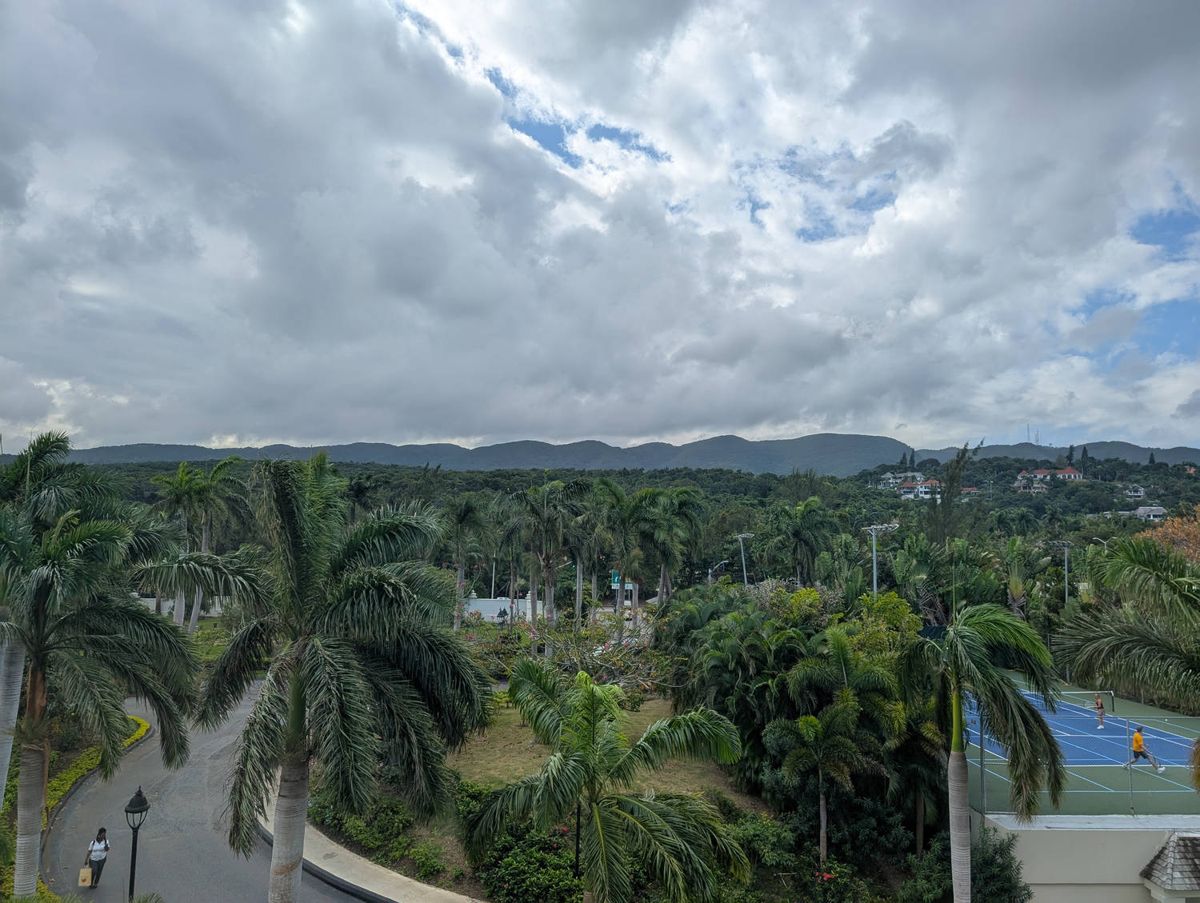 The hills behind the resort under clouds