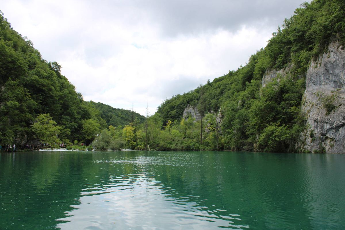 A lake between cliffs