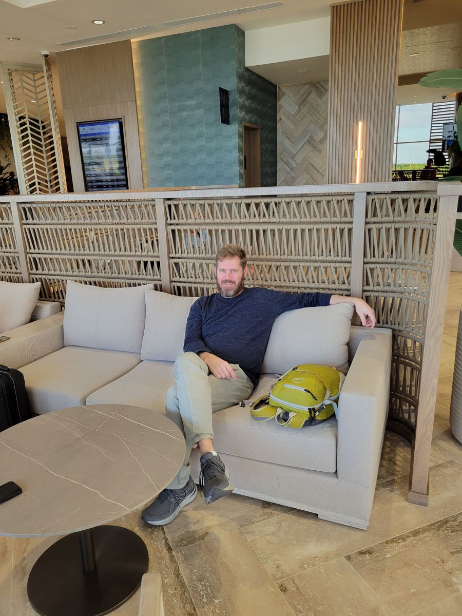Brendan on a sofa in the lounge