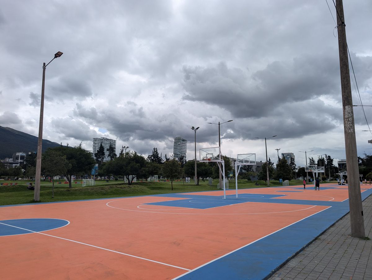 Basketball courts under a grey sky
