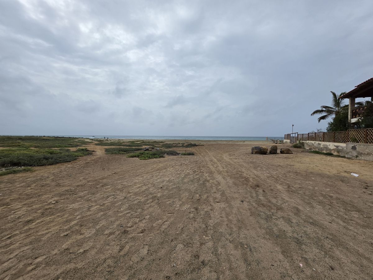 The sandy path out to the water