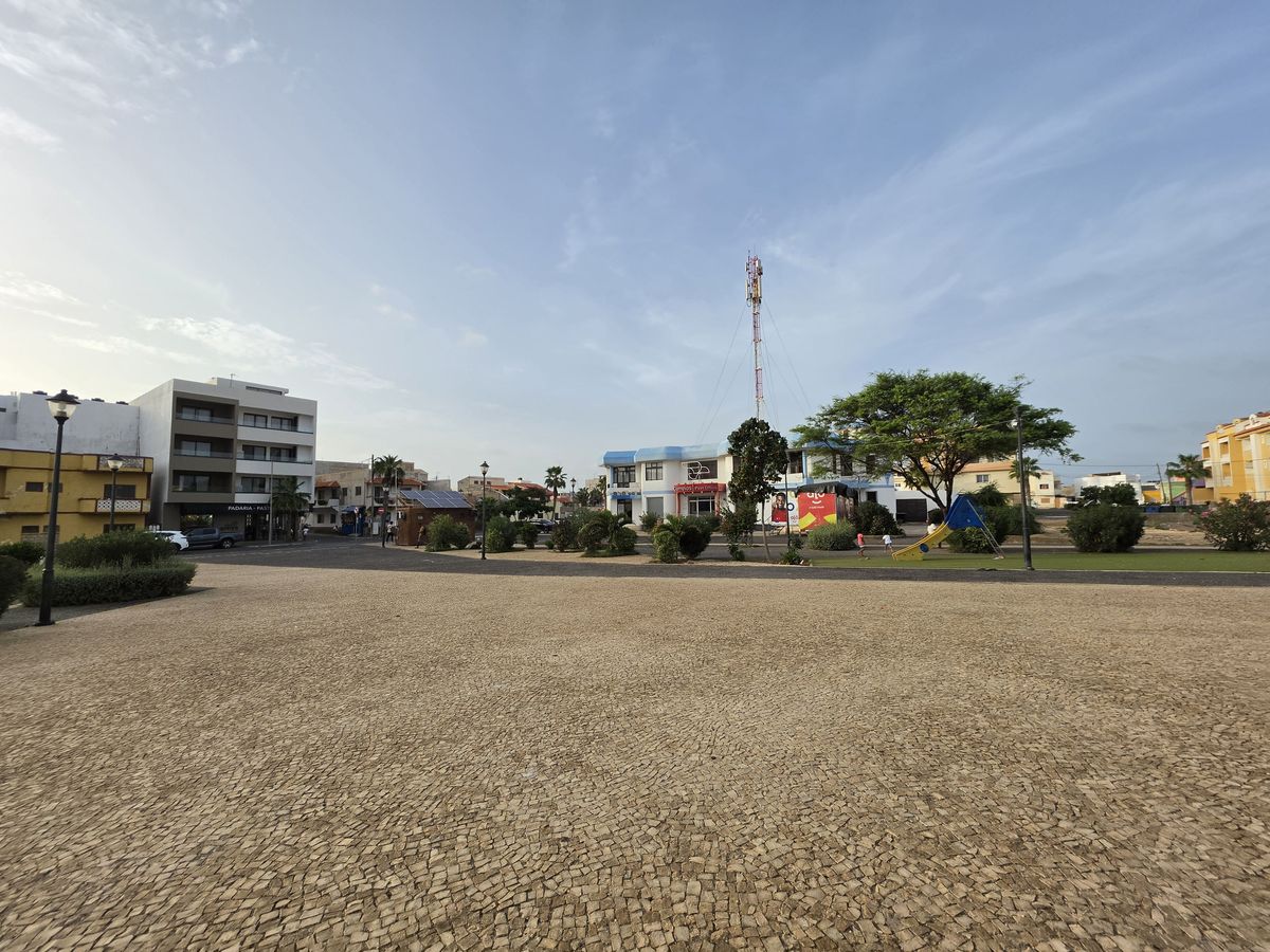 A square with a playground and the post office