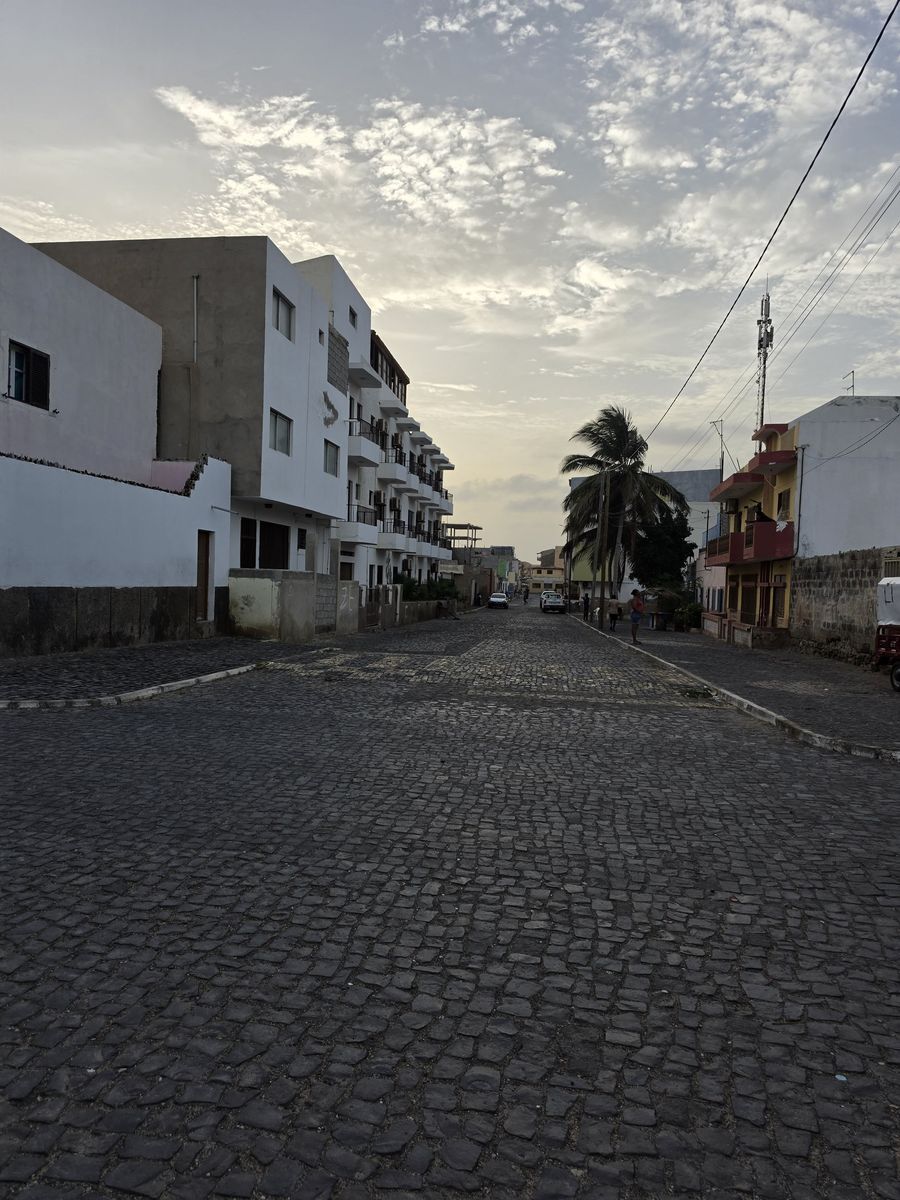 Whiter buildings toward the edge of town