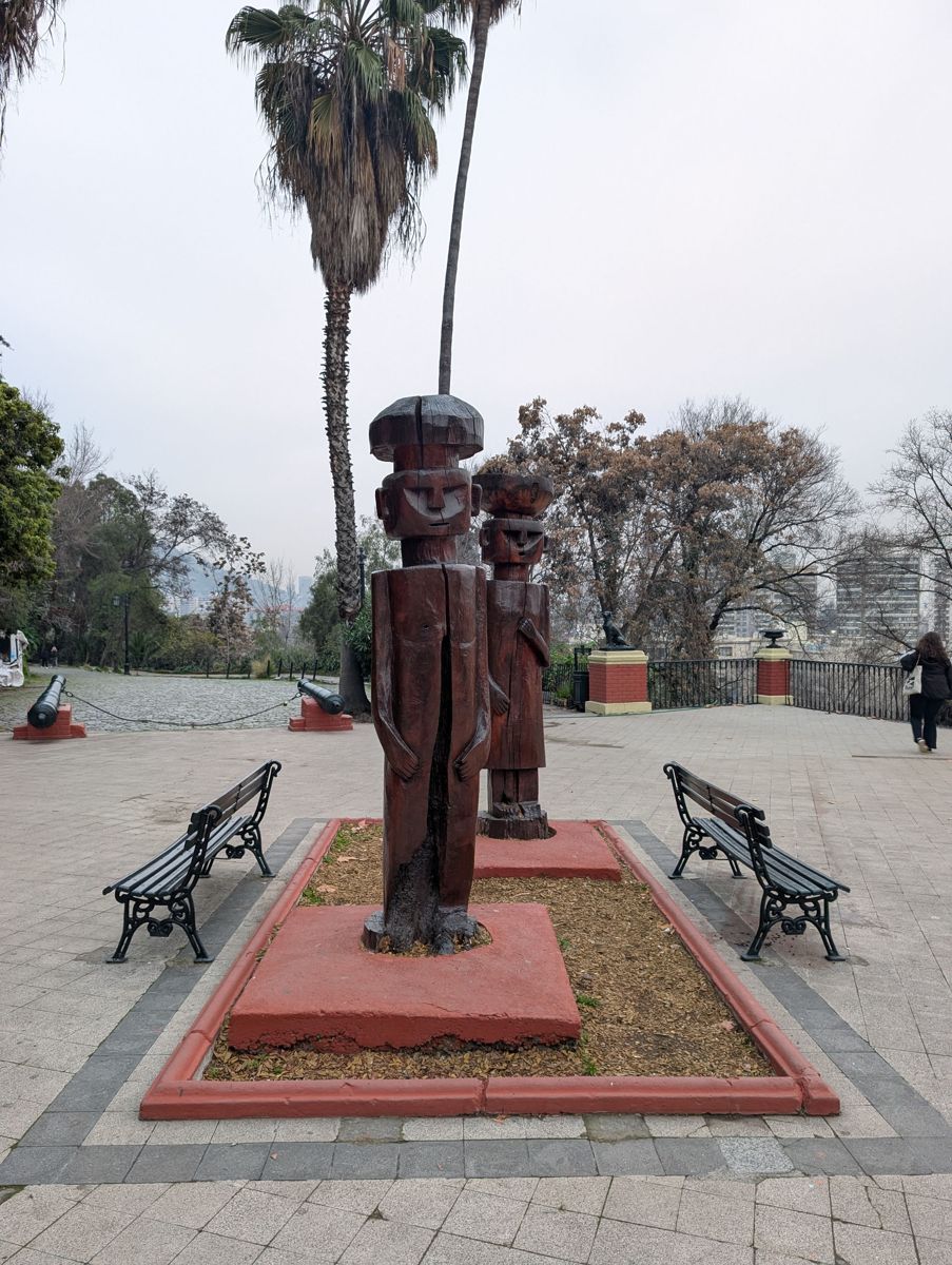Carved wooden figures on a terrace