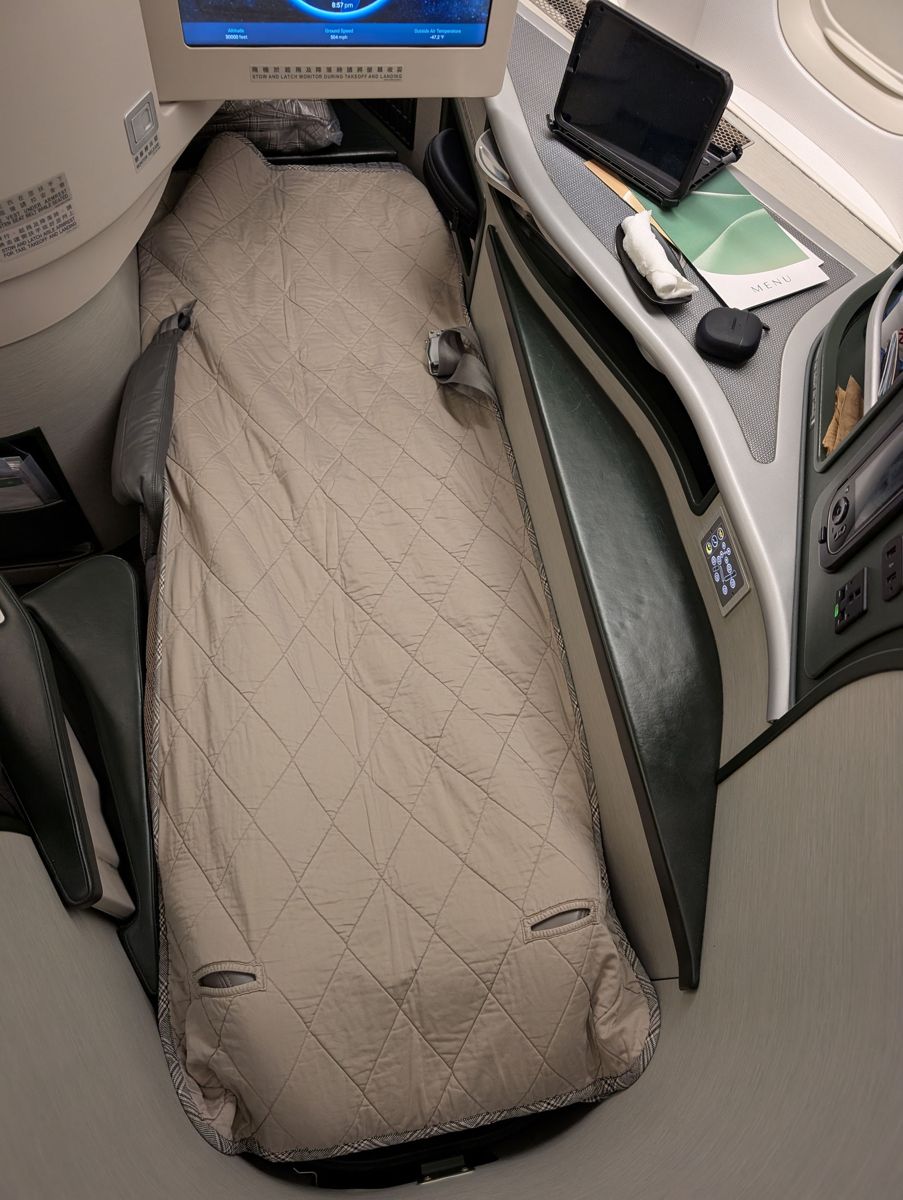 Made up with the quilted mattress pad