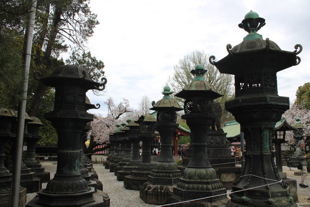 Bronze lanterns along the path
