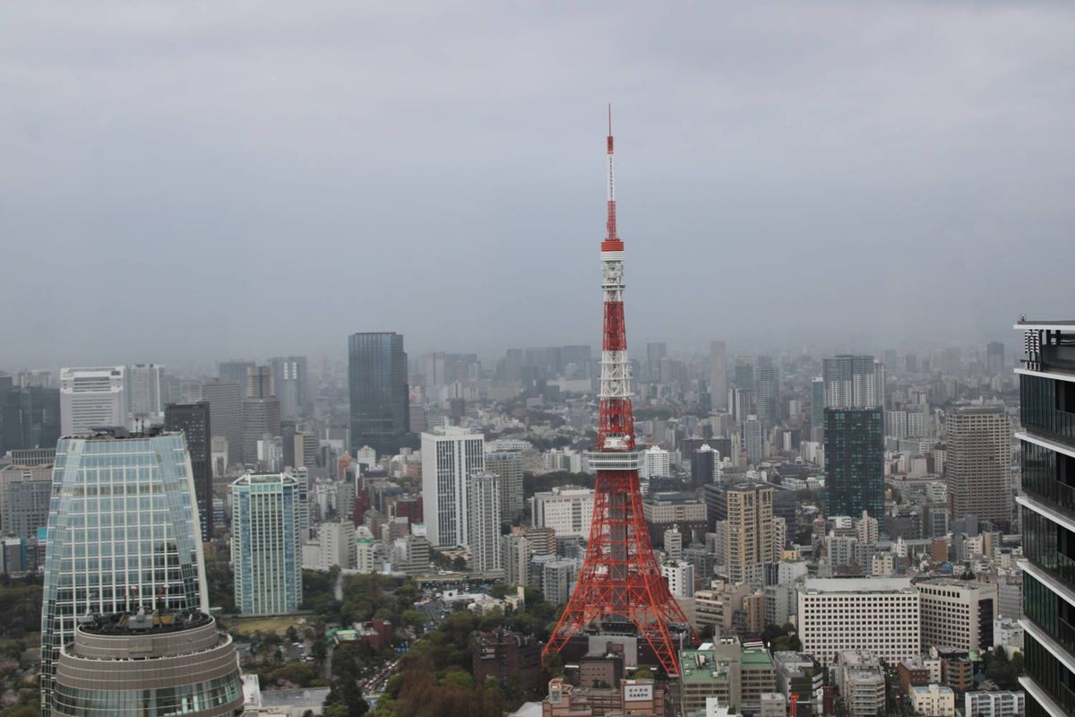 Tokyo Tower in the haze from a high floor