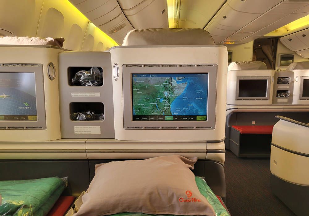 The seat area with the Cloud Nine pillow and bedding